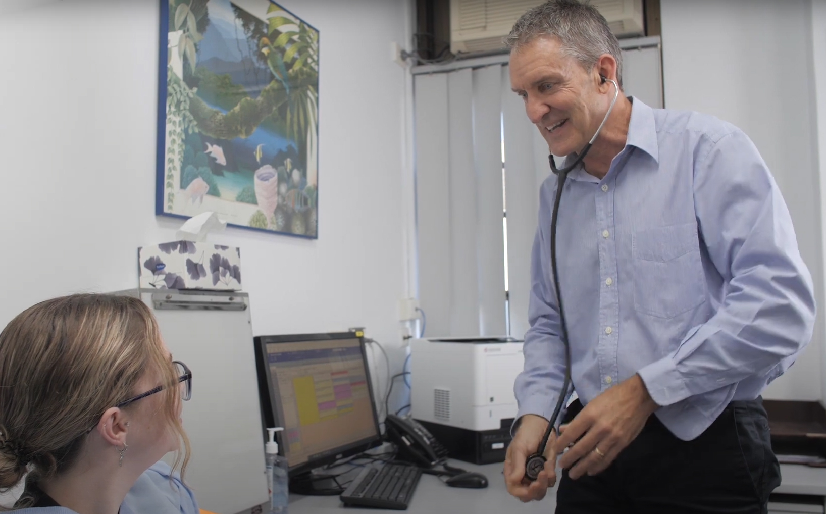 Dr Jones consulting with a patient